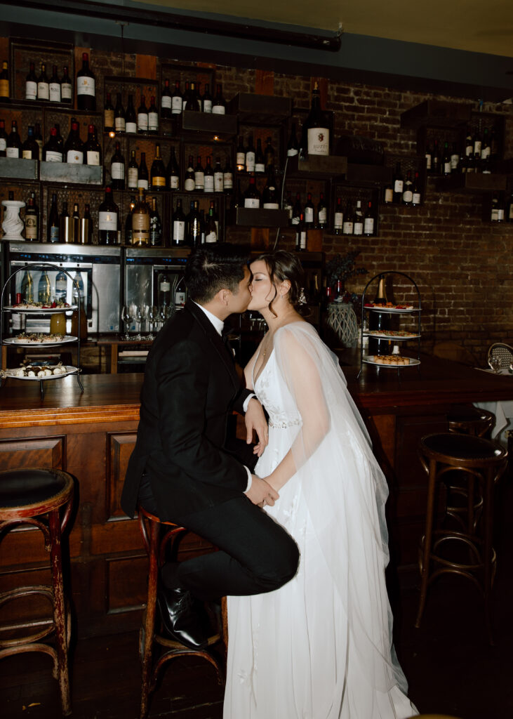 Romantic bride and groom photo at Bacchus Bistro a Vins