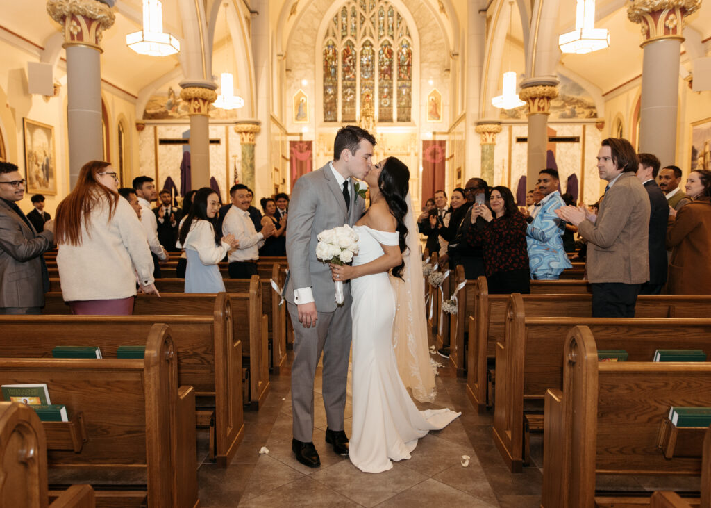 A traditional wedding ceremony at Our Lady of Mount Carmel Catholic Church in Queens