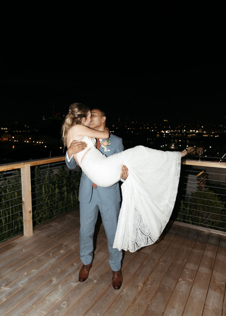 bride and groom nighttime rooftop wedding portraits