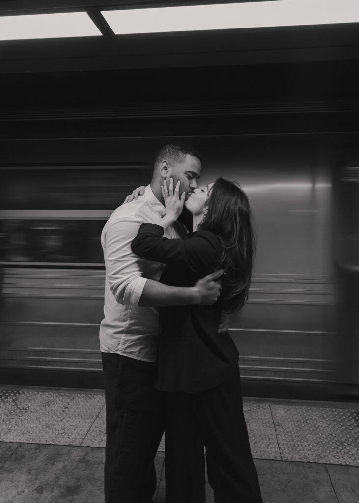 intimate motion blur engagement photo in metro station