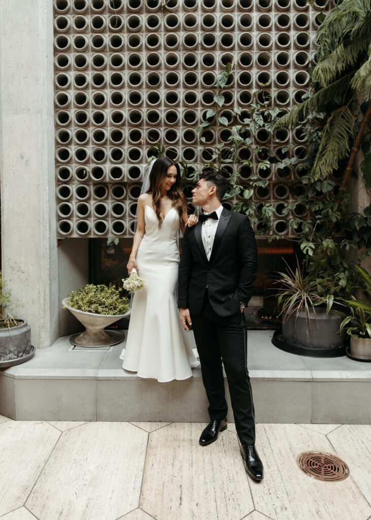 bride and groom portraits at an elegant hotel lobby