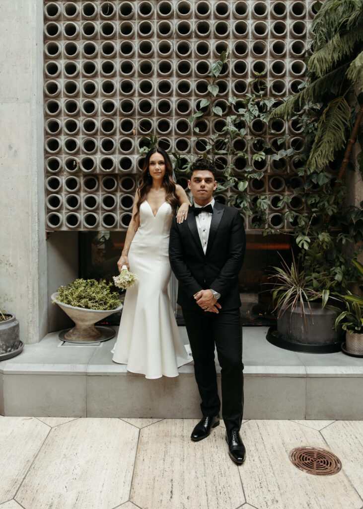 bride and groom portraits at an elegant hotel lobby